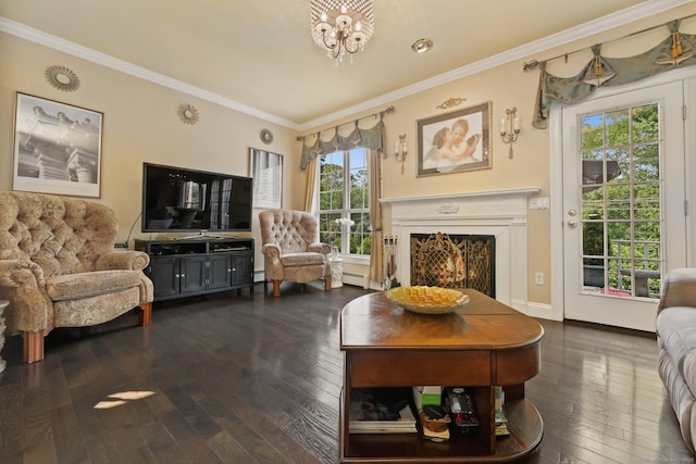40 Pumpkin Ground Rd, Stratford, CT 06614 - living room with dark wood finished floors, a lit fireplace, crown molding, a chandelier, and a baseboard radiator