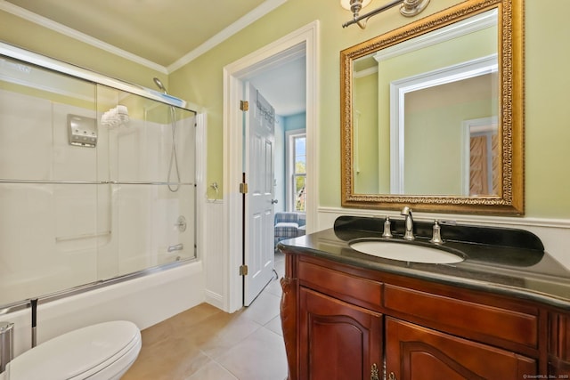 40 Pumpkin Ground Rd, Stratford, CT 06614 - bathroom featuring crown molding, vanity, tile patterned flooring, enclosed tub / shower combo, and wainscoting