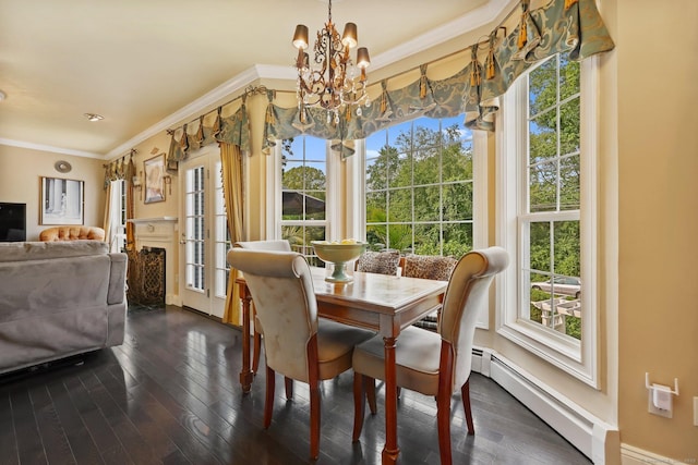 40 Pumpkin Ground Rd, Stratford, CT 06614 - dining area featuring a chandelier, a baseboard heating unit, ornamental molding, plenty of natural light, and dark wood finished floors
