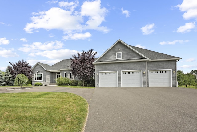 8 Amolia Farms Rd, Windsor, CT 06095 - view of front facade featuring a front lawn, a garage, and driveway