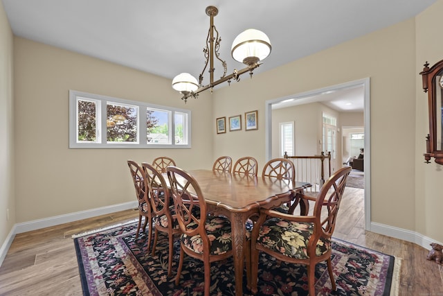 8 Amolia Farms Rd, Windsor, CT 06095 - dining space featuring a chandelier and light wood finished floors