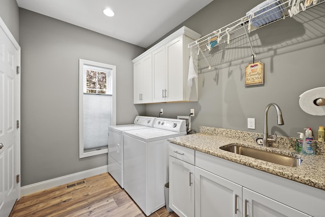 8 Amolia Farms Rd, Windsor, CT 06095 - washroom featuring separate washer and dryer, cabinet space, light wood finished floors, and recessed lighting