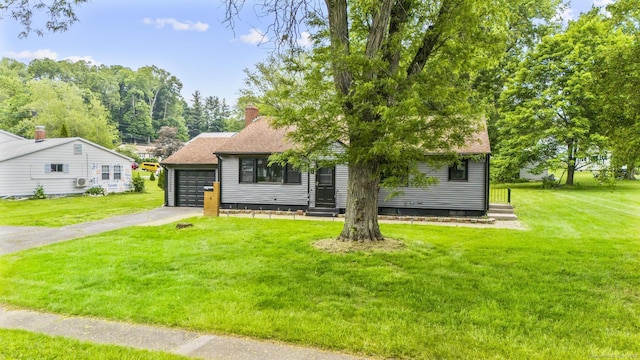 4 Hill Farm Rd, Bloomfield, CT 06002 - view of front facade with a front yard, entry steps, asphalt driveway, and a chimney