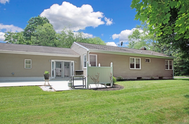 4 White Birch Dr, Guilford, CT 06437 - back of house with a yard, a patio area, and a shingled roof