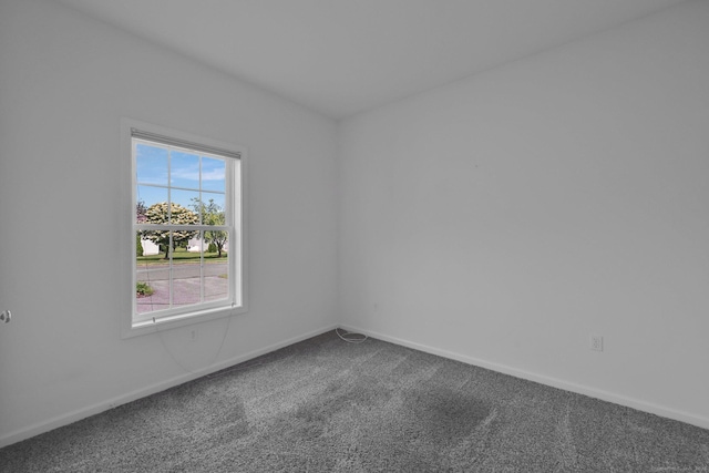 14 Ross Way Unit 14, Windsor Locks, CT 06096 - empty room featuring healthy amount of natural light and dark carpet