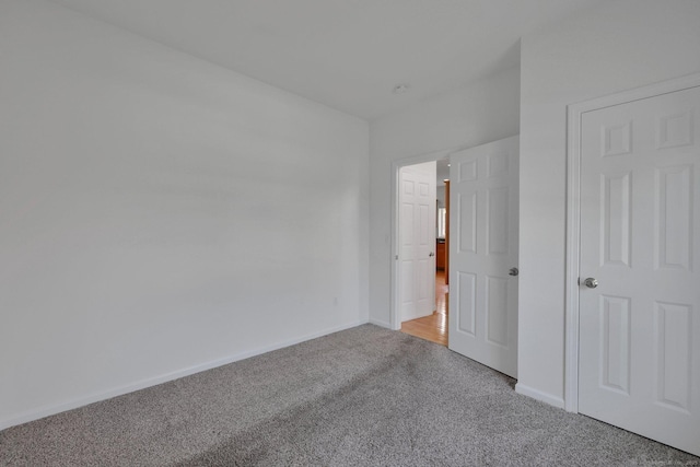 14 Ross Way Unit 14, Windsor Locks, CT 06096 - unfurnished bedroom featuring light colored carpet and baseboards