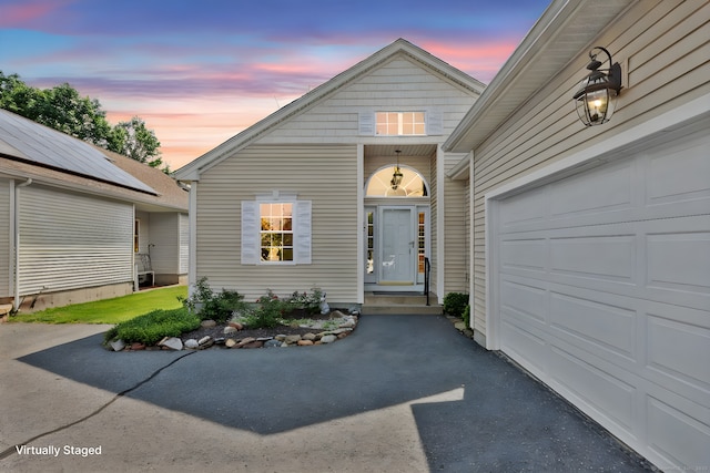 14 Ross Way Unit 14, Windsor Locks, CT 06096 - doorway to property with asphalt driveway and an attached garage