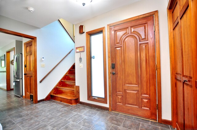 127 Weldon Ct, Goshen, CT 06756 - entryway featuring baseboards and stairs