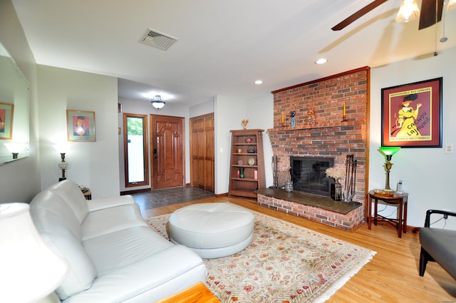 127 Weldon Ct, Goshen, CT 06756 - living area with ceiling fan, wood finished floors, recessed lighting, and a brick fireplace