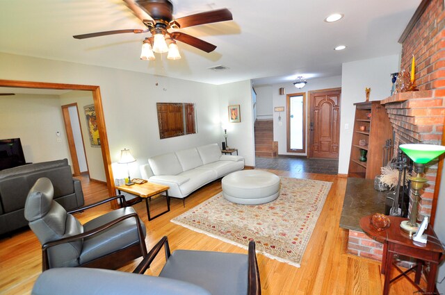 127 Weldon Ct, Goshen, CT 06756 - living area featuring a fireplace, a ceiling fan, wood finished floors, and recessed lighting