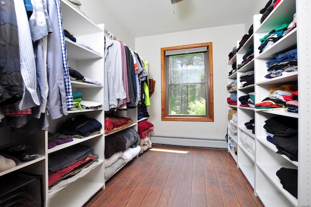127 Weldon Ct, Goshen, CT 06756 - spacious closet featuring a baseboard radiator and dark wood finished floors