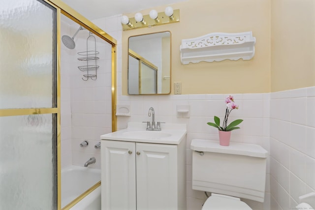71 Strawberry Hill Ave Apt 1002, Stamford, CT 06902 - full bath with vanity, shower / bath combination with glass door, and tile walls