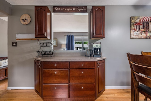 309 Russo Dr, Hamden, CT 06518 - kitchen featuring light wood finished floors and light countertops