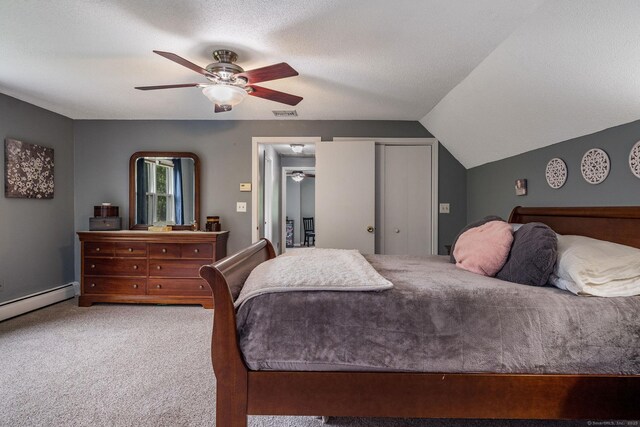 309 Russo Dr, Hamden, CT 06518 - bedroom with carpet floors, a baseboard radiator, a closet, lofted ceiling, and ceiling fan
