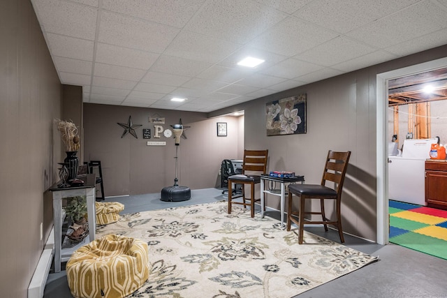 309 Russo Dr, Hamden, CT 06518 - recreation room with washer / clothes dryer, concrete flooring, a drop ceiling, and baseboard heating
