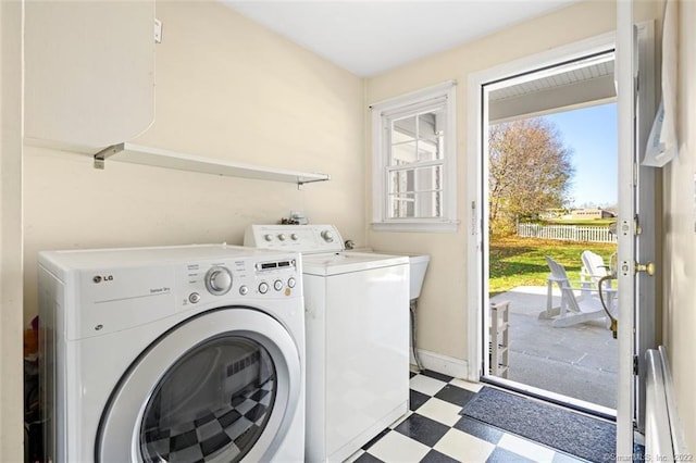 154 Mohawk Dr, West Hartford, CT 06117 - laundry room featuring tile patterned floors and separate washer and dryer