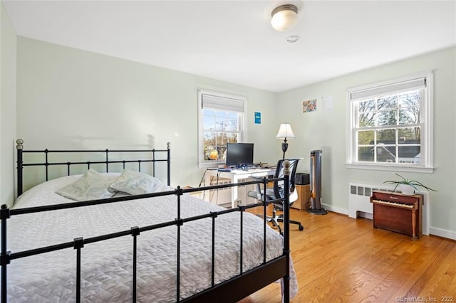 154 Mohawk Dr, West Hartford, CT 06117 - bedroom with light wood-style floors and a desk