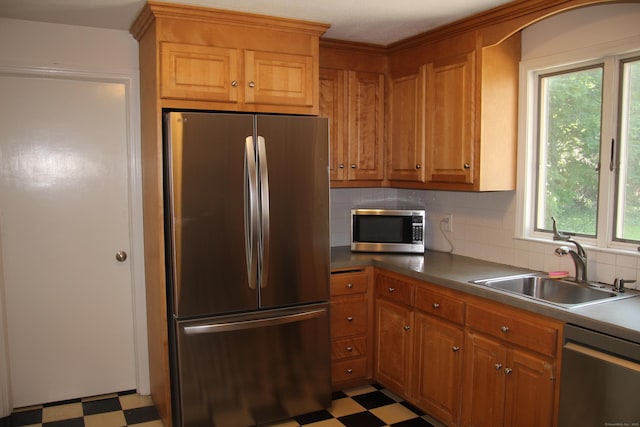 154 Mohawk Dr, West Hartford, CT 06117 - kitchen featuring stainless steel appliances, light flooring, tasteful backsplash, and plenty of natural light