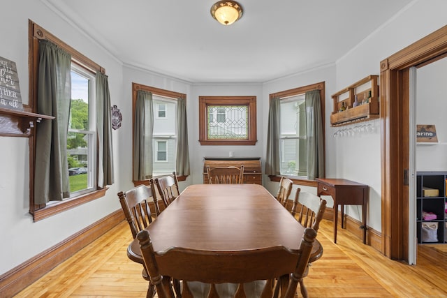 135 W Thames St, Norwich, CT 06360 - dining area with light wood-style flooring and ornamental molding