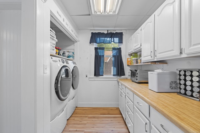 135 W Thames St, Norwich, CT 06360 - washroom with separate washer and dryer and light wood-style floors