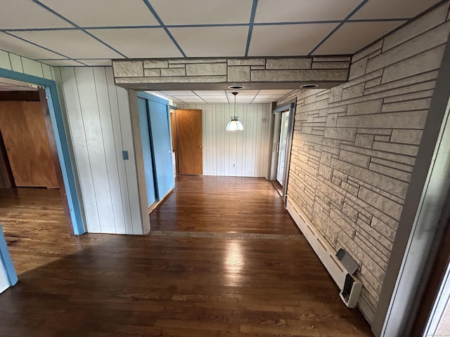 306 Divinity St, Bristol, CT 06010 - unfurnished dining area with wood finished floors, a paneled ceiling, and wood walls