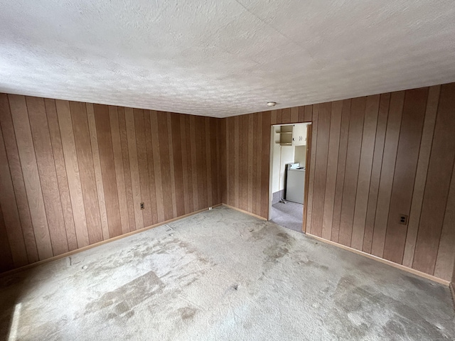306 Divinity St, Bristol, CT 06010 - unfurnished room with a textured ceiling, light carpet, and wooden walls