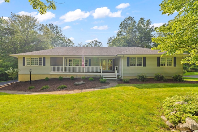 115 Remington Rd, Ridgefield, CT 06877 - ranch-style home featuring a porch and a front lawn