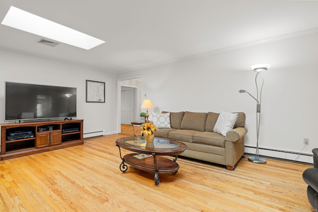 115 Remington Rd, Ridgefield, CT 06877 - living area featuring a skylight, a baseboard heating unit, crown molding, and light wood-style floors