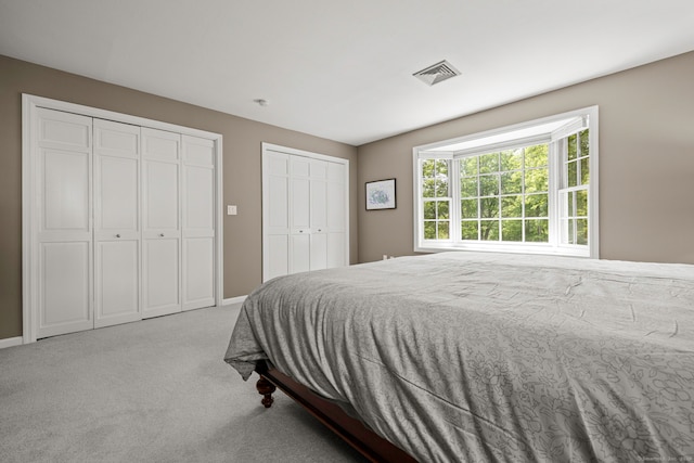 115 Remington Rd, Ridgefield, CT 06877 - bedroom with multiple closets and carpet
