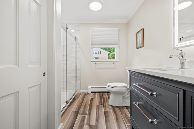 115 Remington Rd, Ridgefield, CT 06877 - bathroom featuring a baseboard radiator, vanity, a shower stall, crown molding, and wood finished floors