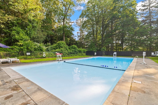 115 Remington Rd, Ridgefield, CT 06877 - view of swimming pool featuring view of wooded area