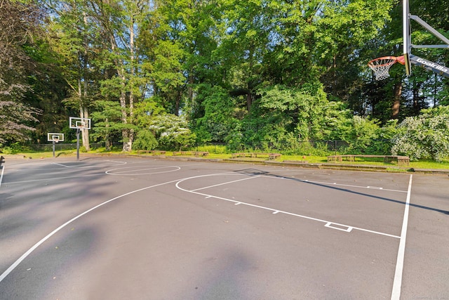 115 Remington Rd, Ridgefield, CT 06877 - view of sport court with community basketball court and view of wooded area
