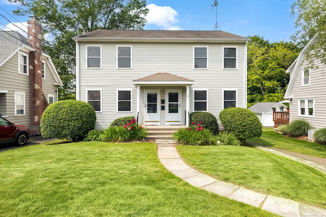 17 Glenwood Ave, Norwalk, CT 06854 - view of front of home featuring a front lawn and roof with shingles