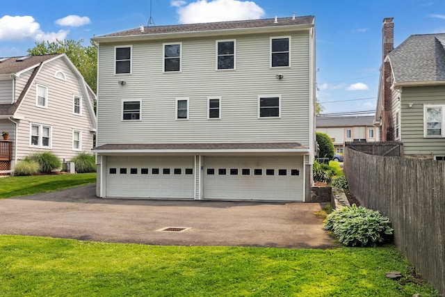 17 Glenwood Ave, Norwalk, CT 06854 - back of house with driveway and an attached garage