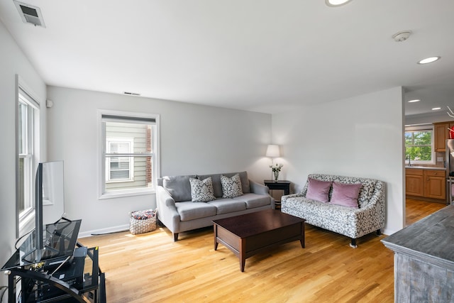 17 Glenwood Ave, Norwalk, CT 06854 - living area featuring light wood finished floors and recessed lighting