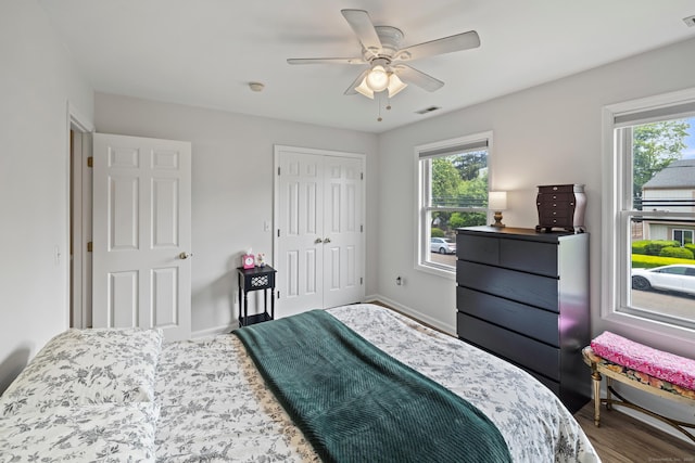 17 Glenwood Ave, Norwalk, CT 06854 - bedroom featuring multiple windows, a closet, ceiling fan, and wood finished floors