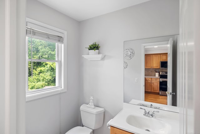 17 Glenwood Ave, Norwalk, CT 06854 - bathroom featuring vanity and decorative backsplash
