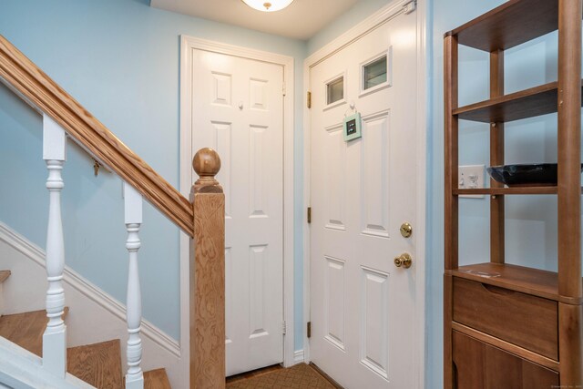 244 Stanwood Dr, New Britain, CT 06053 - entrance foyer with stairs and baseboards
