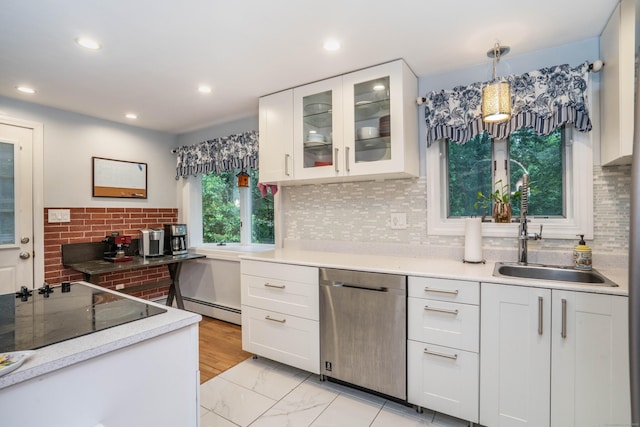 244 Stanwood Dr, New Britain, CT 06053 - kitchen featuring dishwasher, white cabinets, glass insert cabinets, light countertops, and decorative backsplash