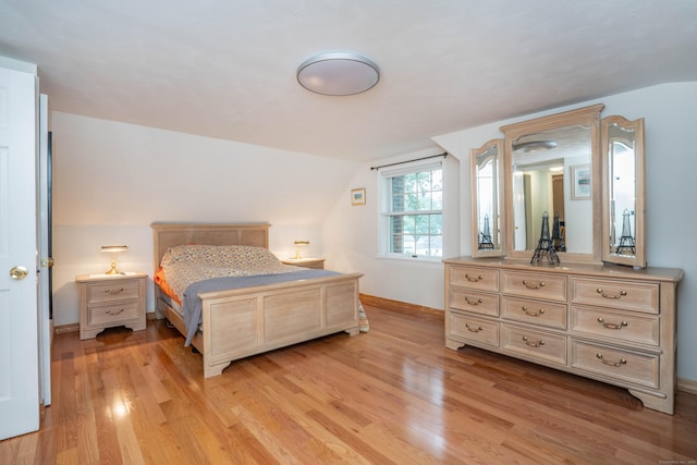 244 Stanwood Dr, New Britain, CT 06053 - bedroom with light wood-style flooring and lofted ceiling