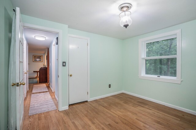 244 Stanwood Dr, New Britain, CT 06053 - unfurnished bedroom featuring light wood-type flooring and baseboards