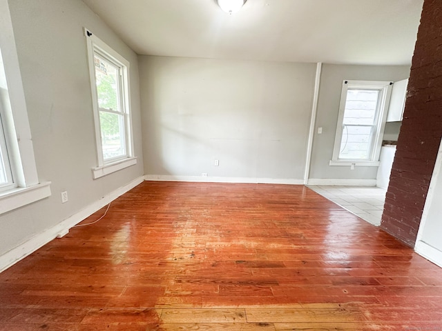 666 Orchard St, New Haven, CT 06511 - spare room featuring hardwood / wood-style floors and baseboards
