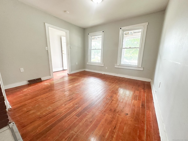 666 Orchard St, New Haven, CT 06511 - unfurnished room with hardwood / wood-style floors and a smoke detector