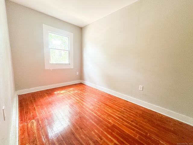 666 Orchard St, New Haven, CT 06511 - unfurnished room with light wood finished floors and baseboards