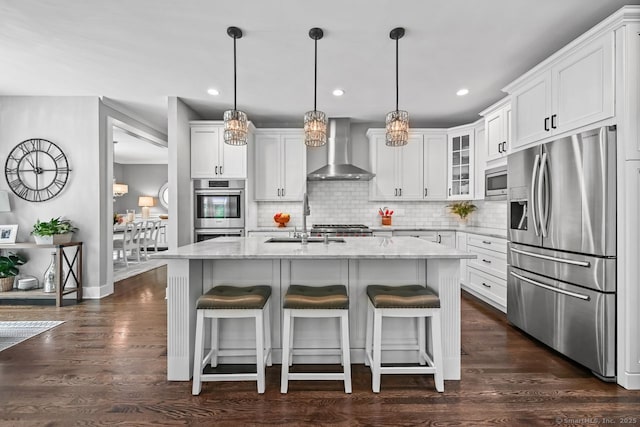 7 Forest View Dr, Newtown, CT 06482 - kitchen featuring appliances with stainless steel finishes, wall chimney range hood, white cabinetry, glass insert cabinets, and decorative backsplash