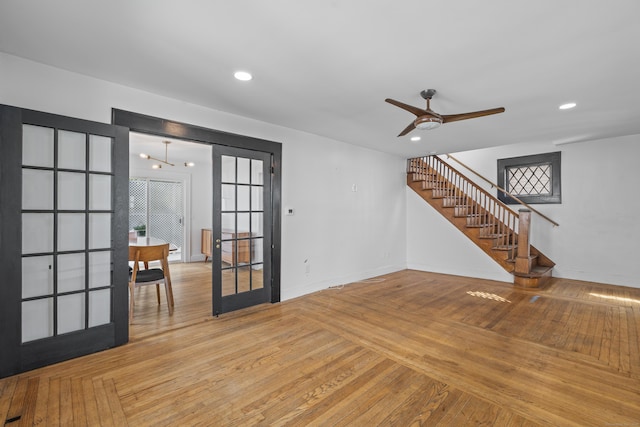 94 Prospect Ave, West Haven, CT 06516 - empty room with stairs, french doors, ceiling fan, light wood finished floors, and recessed lighting
