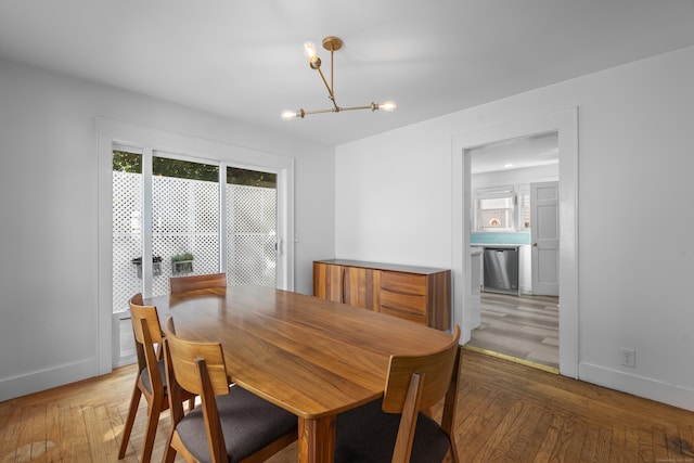 94 Prospect Ave, West Haven, CT 06516 - dining area featuring a chandelier and light wood-type flooring
