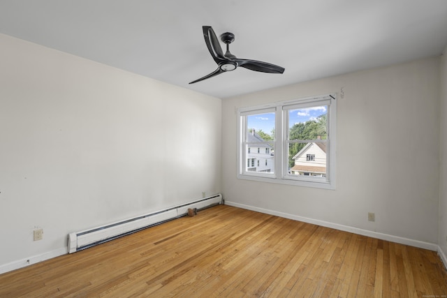 94 Prospect Ave, West Haven, CT 06516 - spare room with baseboard heating, light wood-type flooring, and a ceiling fan
