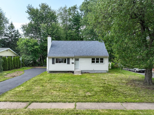 32 Miles Standish Dr, West Hartford, CT 06107 - view of front of property featuring entry steps, a chimney, a front lawn, and a shingled roof