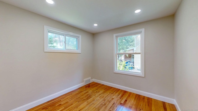 32 Miles Standish Dr, West Hartford, CT 06107 - unfurnished room featuring healthy amount of natural light, light wood finished floors, and recessed lighting